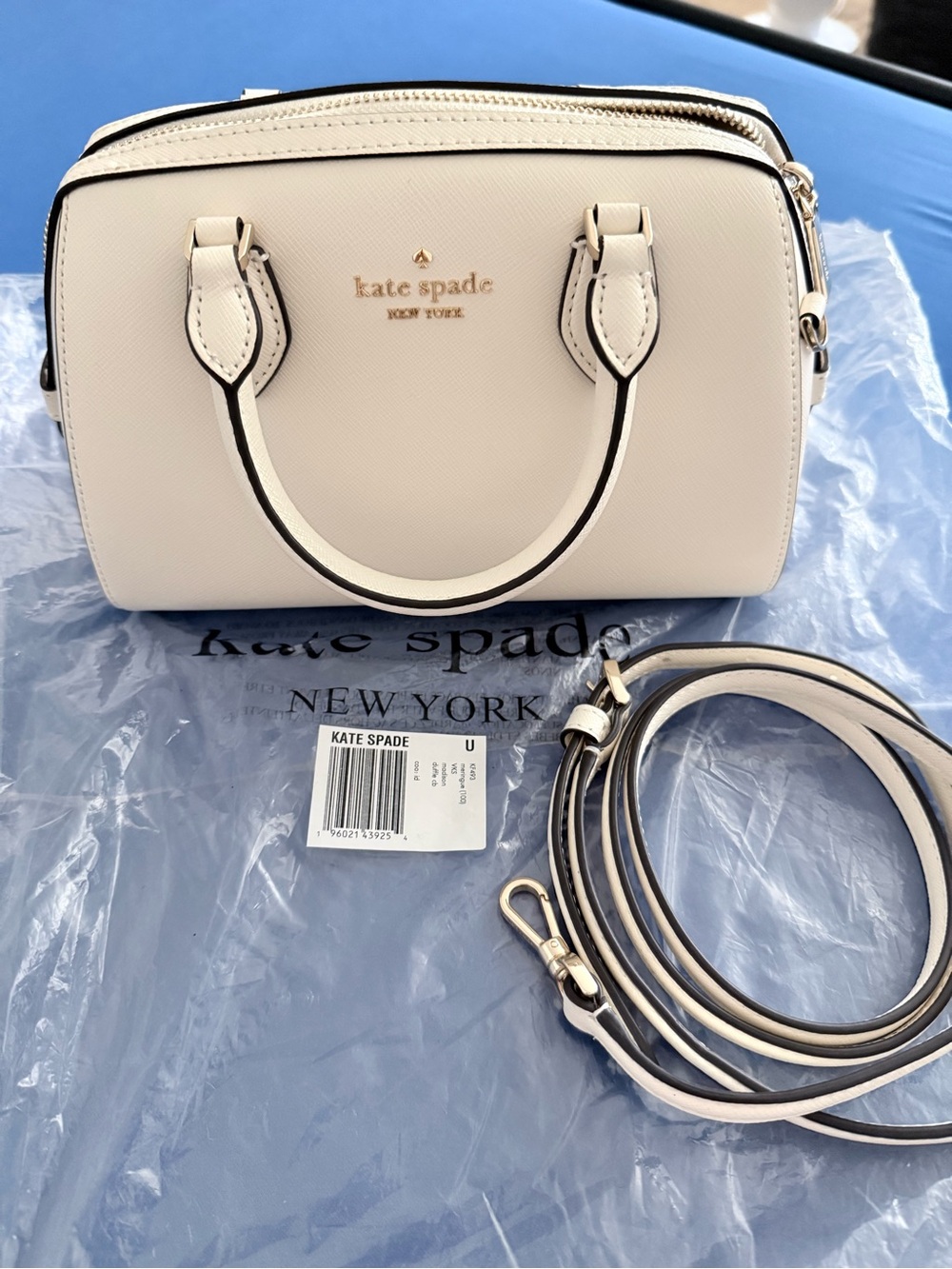 kate spade cream mini satchel with detachable strap and gold hardware